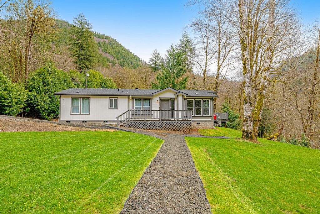 Dog friendly waterfront home on the Wilson River with great views deck and WiFi