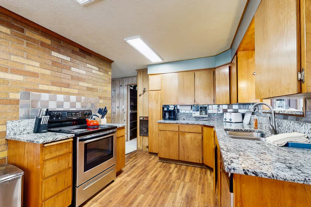 Centrally located home with lake views private pool and spacious deck