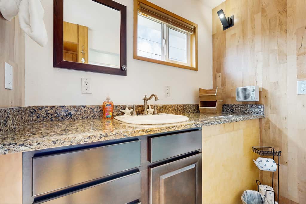 Centrally located home with lake views private pool and spacious deck