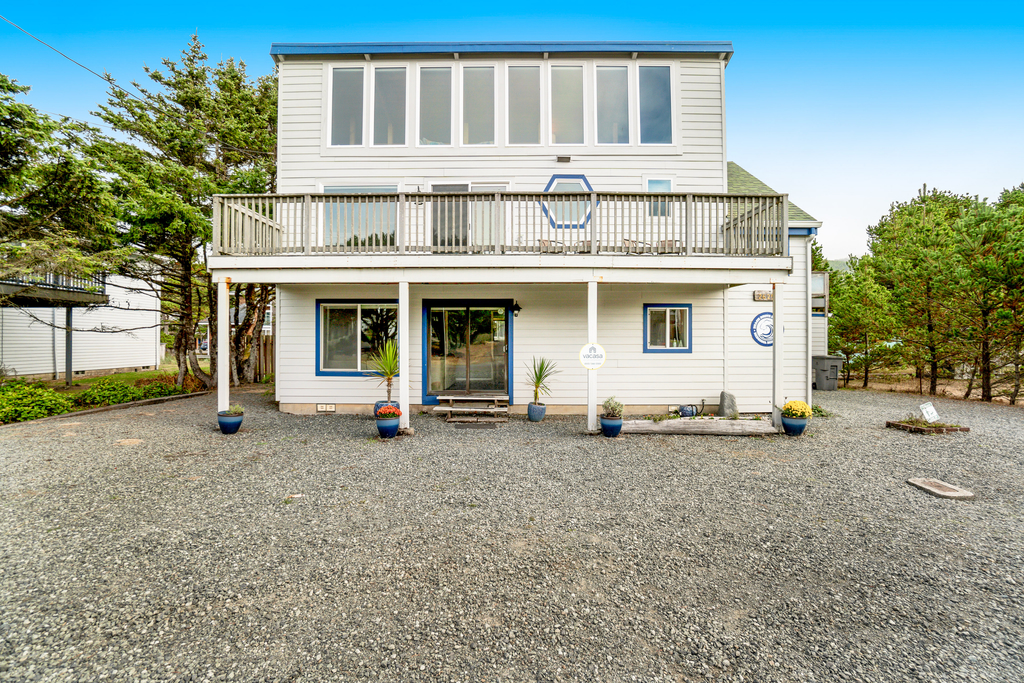 Dog friendly home across street from beach with rooftop deck and views