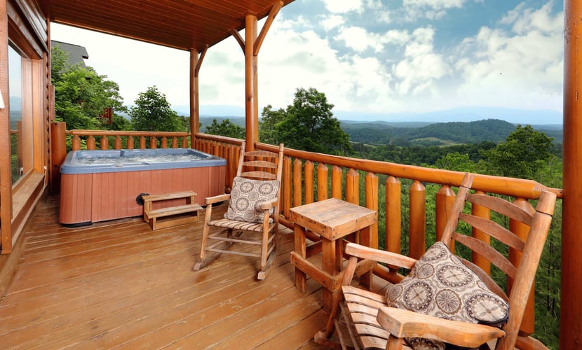 Unwind in mountain luxury at this cozy retreat in Legacy Mountain Resort, your perfect base to explore Sevierville, Pigeon Forge, and Gatlinburg. Enjoy breathtaking Smoky Mountain views from the deck, soak in your private hot tub, or relax by the electric fireplace. With a game room featuring a pool table, arcade, and card table, plus two living areas with Smart Roku TVs, a jacuzzi tub, a fully equipped kitchen, and pet-friendly comfort (fee applies), this cabin sleeps 8 in style.