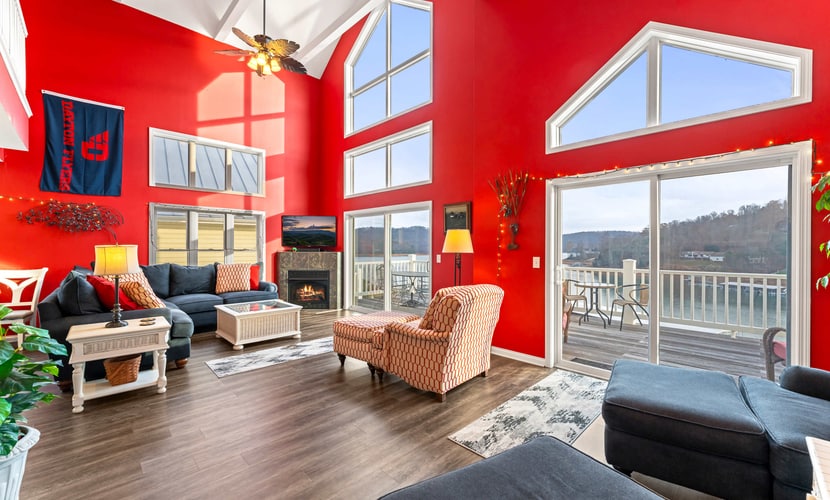 Spacious 5-bedroom townhouse in gated Deerfield Resort on Norris Lake in LaFollette, TN, offering room for up to 14 guests. Enjoy beautiful lake views, a private deck with gas grill, covered boat slip, seasonal resort pool access, and comfortable spaces for gathering. Inside, you'll find a fully equipped kitchen, fireplace, board games, fast Wi-Fi, dedicated workspace, and washer/dryer. Ideal for family trips, boating, fishing, golf, and relaxing getaways.