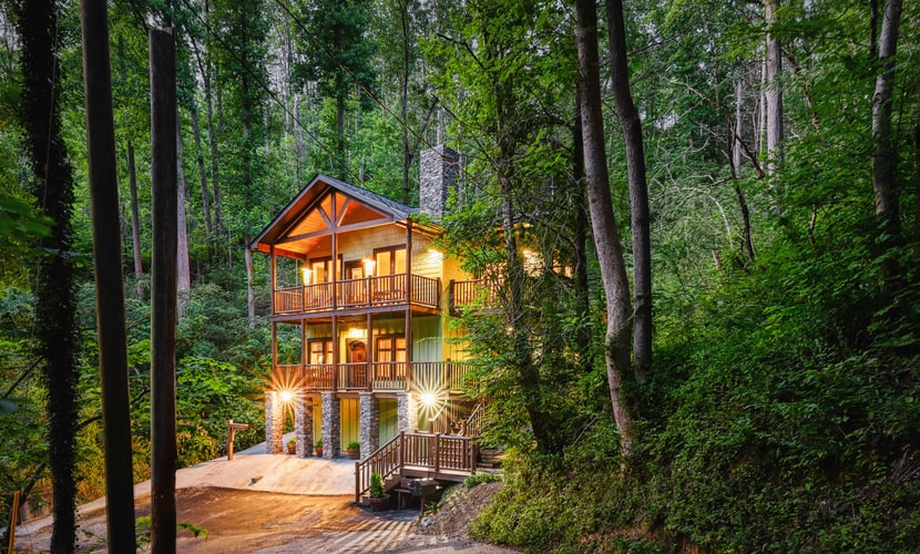 Welcome to The Grand Fir Chalet, a newly built 5-bedroom, 4-bathroom Gatlinburg cabin that sleeps 10, featuring four king suites, a 6-person hot tub, arcade games, two living rooms, three private decks, and a fully equipped kitchen. Just 1.4 miles from Downtown Gatlinburg and 1.6 miles from Great Smoky Mountains National Park, it’s an ideal Smoky Mountain retreat for families and groups.