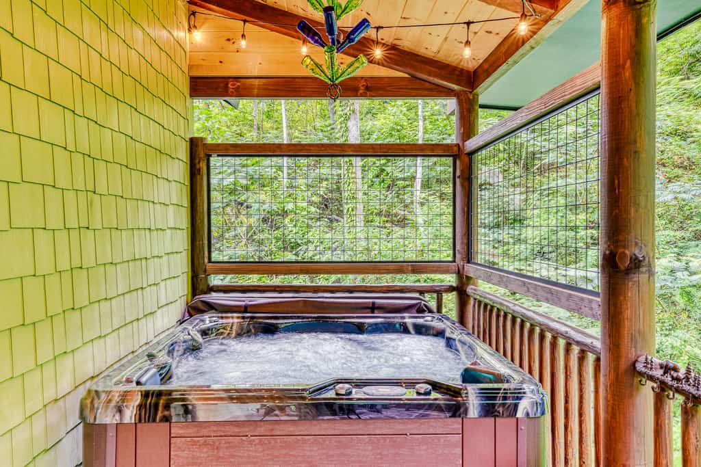Welcome to The Grand Fir Chalet, a newly built 5-bedroom, 4-bathroom Gatlinburg cabin that sleeps 10, featuring four king suites, a 6-person hot tub, arcade games, two living rooms, three private decks, and a fully equipped kitchen. Just 1.4 miles from Downtown Gatlinburg and 1.6 miles from Great Smoky Mountains National Park, it’s an ideal Smoky Mountain retreat for families and groups.