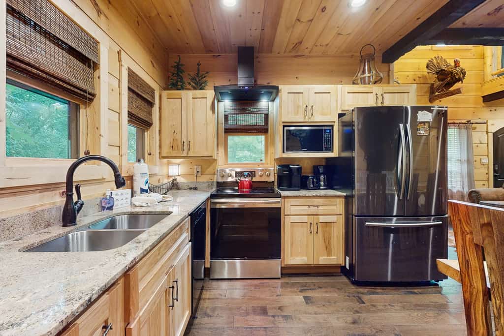 Welcome to The Grand Fir Chalet, a newly built 5-bedroom, 4-bathroom Gatlinburg cabin that sleeps 10, featuring four king suites, a 6-person hot tub, arcade games, two living rooms, three private decks, and a fully equipped kitchen. Just 1.4 miles from Downtown Gatlinburg and 1.6 miles from Great Smoky Mountains National Park, it’s an ideal Smoky Mountain retreat for families and groups.