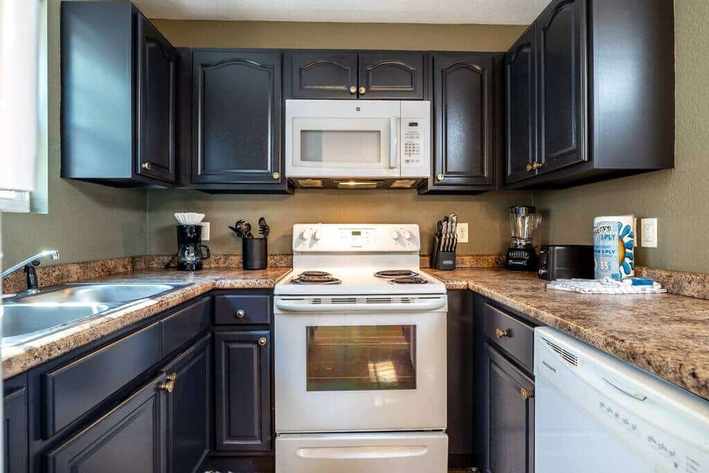 Escape to the Smoky Mountains in this pet-friendly cabin retreat with a private patio and hot tub, perfect for unwinding after exploring nearby attractions like Dollywood and The Island. Enjoy arcade games, a spacious open floor plan, Roku Smart TV, high-speed WiFi, and a fully equipped kitchen. With room to sleep 6, keyless entry, and in-unit washer and dryer, it's ideal for family getaways or group vacations. Book your perfect Pigeon Forge stay today!