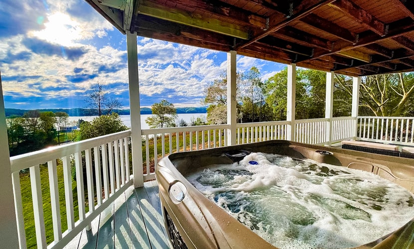 Escape to a spacious 3-bedroom, 3-bath lakefront home on Douglas Lake, perfect for families and groups up to 10. Enjoy a private dock, kayaks, paddle board, hot tub, wrap-around deck, fire pit, lake and sunset views, ping-pong, Smart TVs, fast WiFi, and a fully equipped kitchen. Conveniently located for exploring Dandridge, Sevierville, Pigeon Forge, Dollywood, and the Smoky Mountains.