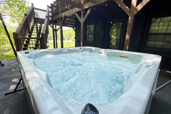 Douglas Haus is a lakefront cabin in Dandridge, TN featuring a private dock, hot tub, kayaks, lake views, mountain scenery, and comfortable accommodations for families and groups. Enjoy direct lake access, outdoor relaxation, a fire pit, gas grill, ping-pong, and peaceful East Tennessee surroundings.