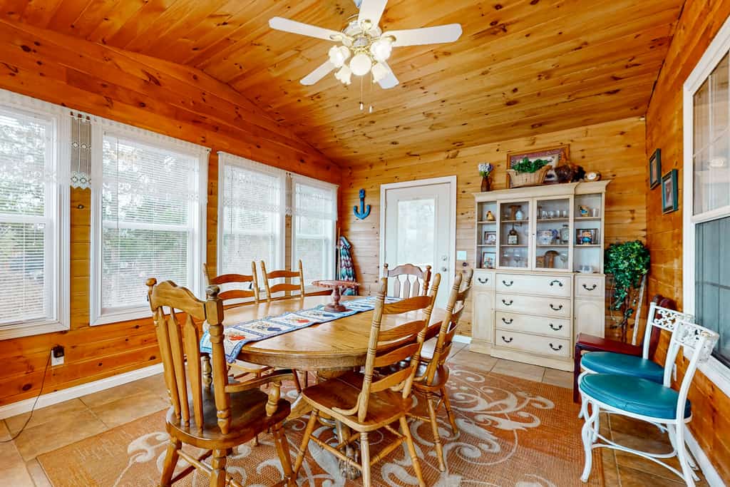 Escape to a rare lakefront retreat on beautiful Douglas Lake. Wake up to breathtaking water views, enjoy sunsets from the deck, fish or boat from the private dock, and gather around the fire pit under the stars. Minutes from the Smoky Mountains, Dollywood, Gatlinburg, and Pigeon Forge, this home offers the perfect blend of relaxation and adventure. Prime dates fill quickly, book now and create unforgettable memories on the water.