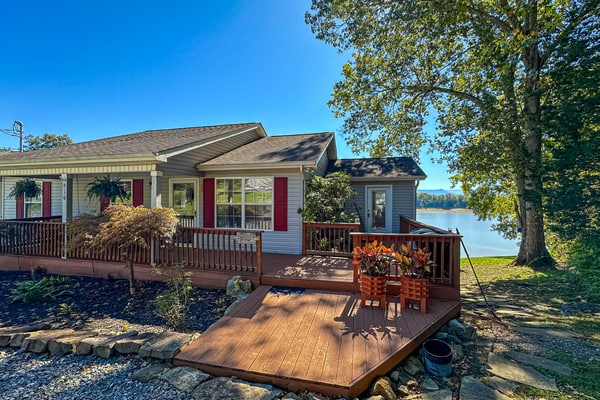 Escape to a rare lakefront retreat on beautiful Douglas Lake. Wake up to breathtaking water views, enjoy sunsets from the deck, fish or boat from the private dock, and gather around the fire pit under the stars. Minutes from the Smoky Mountains, Dollywood, Gatlinburg, and Pigeon Forge, this home offers the perfect blend of relaxation and adventure. Prime dates fill quickly, book now and create unforgettable memories on the water.
