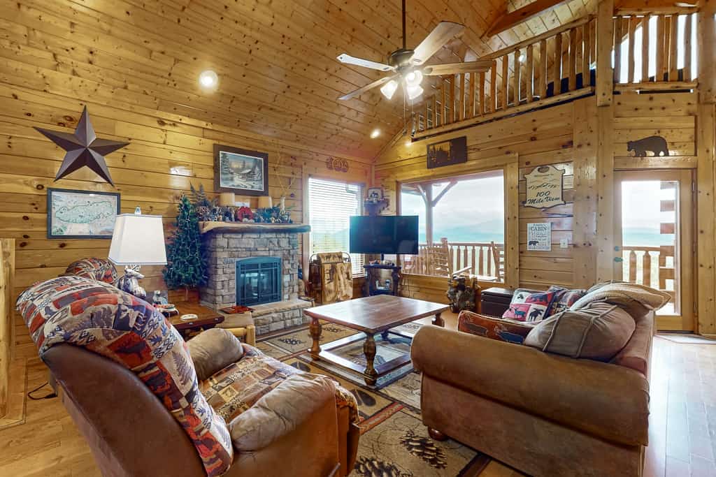 Wake up to breathtaking views of Mt. LeConte and the Smoky Mountains at 100 Mile View! Nestled in Legacy Mountain Resort, this 1-bedroom, 2-bathroom cabin sleeps 4 and is perfect for romantic getaways, honeymoons, anniversaries, or small family escapes. Soak in your private hot tub, enjoy two scenic decks, cozy up by the fireplace, or challenge each other to pool. Enjoy seasonal resort pool access and a peaceful mountain setting just minutes from Dollywood and Pigeon Forge.