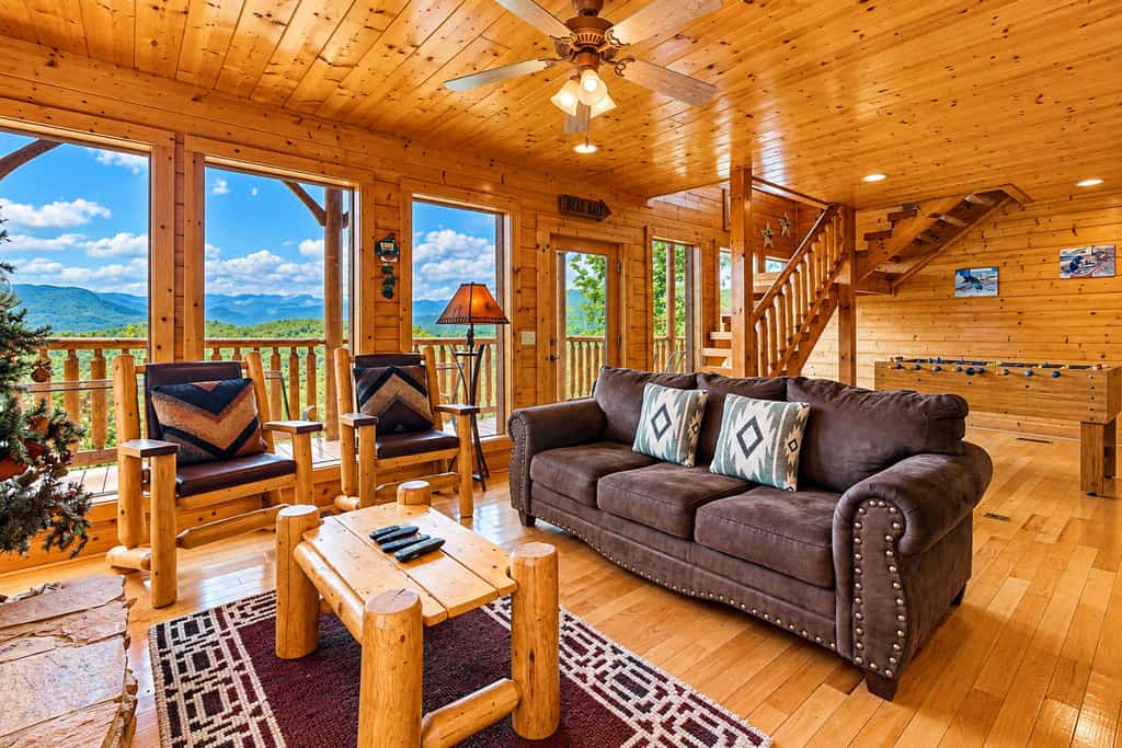 Our 2 bedroom, 3 bathroom Smoky Mountain cabin pairs big Wears Valley views with a three-level layout and plenty of room to unwind.

・Private deck with mountain scenery and outdoor seating
・Pool table, foosball, and fireplace for easy downtime
・Full kitchen plus dining space for shared meals
・3.5 miles from Pigeon Forge
・9.1 miles from Great Smoky Mountains National Park

Settle in, unplug from Wi‑Fi, and enjoy a classic cabin escape with room to breathe.