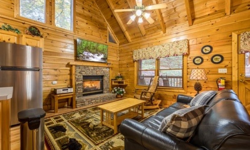 Stay in a cozy one-bedroom log cabin at Eagles Ridge Resort, conveniently located about a mile from the Pigeon Forge Parkway and less than 5 miles from Dollywood. Sleeping up to 4 guests, this retreat features a private hot tub, pool table, in-room jacuzzi, gas fireplace, fully equipped kitchen, gas grill, and two spacious porches. Enjoy easy access to local attractions and dining, then return to a peaceful cabin setting where you can relax and unwind.