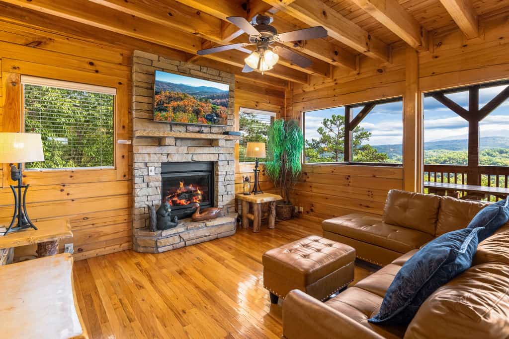 Welcome to our 1 bedroom, 2 bathroom Smoky Mountain cabin, where floor-to-ceiling views and a wood-burning fireplace set the scene.

・Private hot tub with mountain views
・Game loft with pool table, foosball, air hockey, arcade game, and bunk bed
・Two covered decks, charcoal grill, and rocking chairs
・6.4 miles from Pigeon Forge Parkway 
・13 miles from Great Smoky Mountains National Park

Settle in, soak in the view, and make the cabin part of your Smokies getaway.