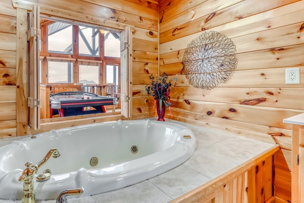 Welcome to our 1 bedroom, 2 bathroom log cabin retreat with panoramic mountain views and a private deck hot tub.
・Private hot tub on the deck
・Pool table, air hockey, and board games
・Wood-burning fireplace and leather seating
・4.5 miles from Downtown Pigeon Forge and 4.6 miles from The Island and outlet shopping
Relax, play, and settle in for an easy mountain escape, book Sweet Surrender and enjoy the cabin comforts at Starr Crest Resort.