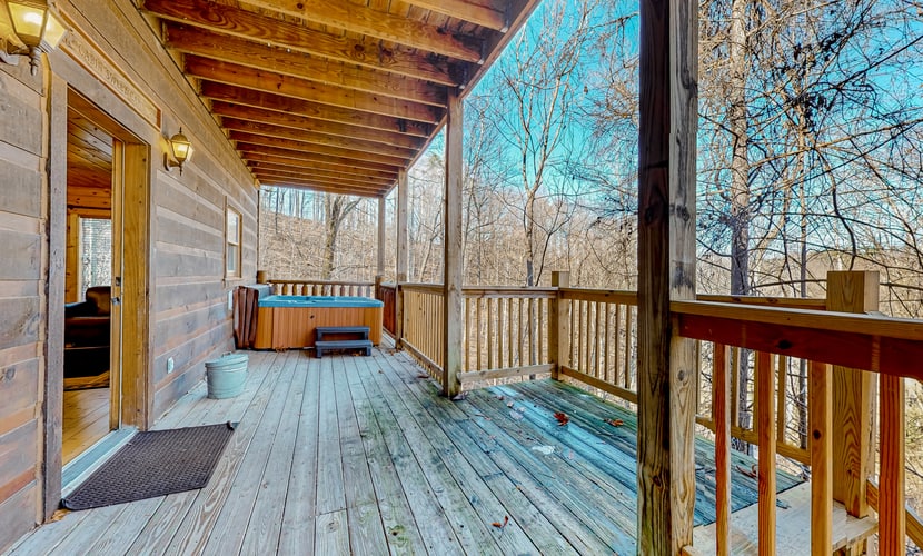 Welcome to our 1 bedroom, 2 bathroom mountain cabin with vaulted ceilings and sunny, wood-lined living spaces.
・Covered front porch with a swing and grill
・Smart TVs in the living room, game room, and bedroom
・Hot tub, pool table, foosball, and air hockey for stay-in fun
・5.5 miles to DT Pigeon Forge
・7 miles to DT Gatlinburg
・12.4 miles to Great Smokies attractions and trails
Settle in, play a round, and enjoy an easy Smoky Mountain getaway.