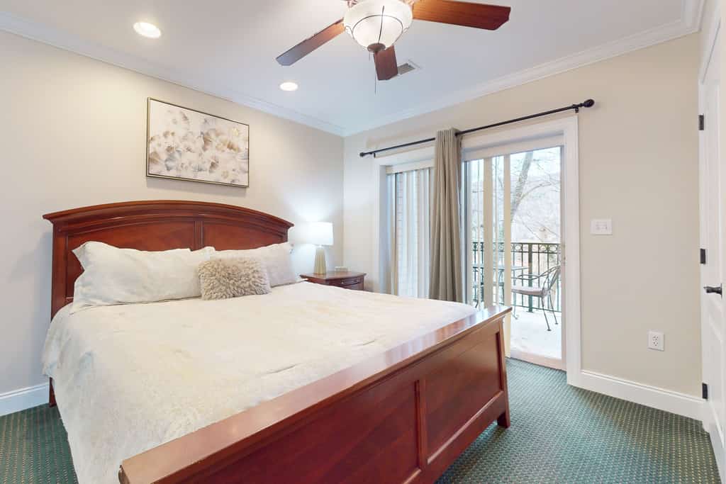 Stay at Summit Manor Condos, just two blocks from downtown Gatlinburg. This 2-bedroom, 2-bath condo sleeps 6 and features mountain views, two private balconies, a gas fireplace, a fully equipped kitchen, free Wi-Fi, and free onsite parking. Enjoy downtown shops, restaurants, and attractions, then unwind in the shared hot tub or seasonal community pool. An ideal base for exploring the Smoky Mountains.