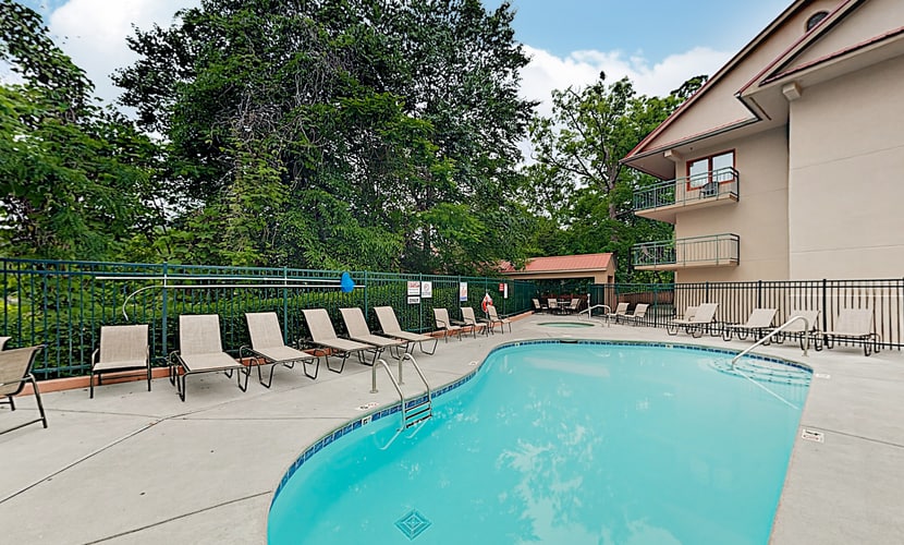 Stay at Summit Manor Condos, just two blocks from downtown Gatlinburg. This 2-bedroom, 2-bath condo sleeps 6 and features mountain views, two private balconies, a gas fireplace, a fully equipped kitchen, free Wi-Fi, and free onsite parking. Enjoy downtown shops, restaurants, and attractions, then unwind in the shared hot tub or seasonal community pool. An ideal base for exploring the Smoky Mountains.