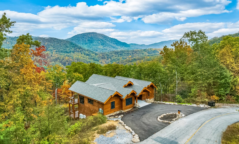 Welcome to this 3-bedroom, 3-bathroom Smoky Mountain cabin in Sevierville, Tennessee, sleeping up to 9 guests. Enjoy wraparound decks with mountain and valley views, a private fitness room, gas fireplace, spacious living areas, a fully equipped kitchen, and private outdoor space. With Great Smoky Mountains National Park just 9.2 miles away, this cabin makes a comfortable home base for family vacations, group getaways, hiking, sightseeing, and exploring Pigeon Forge, Gatlinburg, and Dollywood.