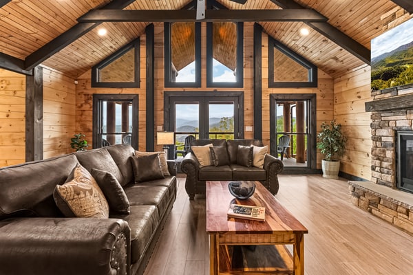 Welcome to this 3-bedroom, 3-bathroom Smoky Mountain cabin in Sevierville, Tennessee, sleeping up to 9 guests. Enjoy wraparound decks with mountain and valley views, a private fitness room, gas fireplace, spacious living areas, a fully equipped kitchen, and private outdoor space. With Great Smoky Mountains National Park just 9.2 miles away, this cabin makes a comfortable home base for family vacations, group getaways, hiking, sightseeing, and exploring Pigeon Forge, Gatlinburg, and Dollywood.
