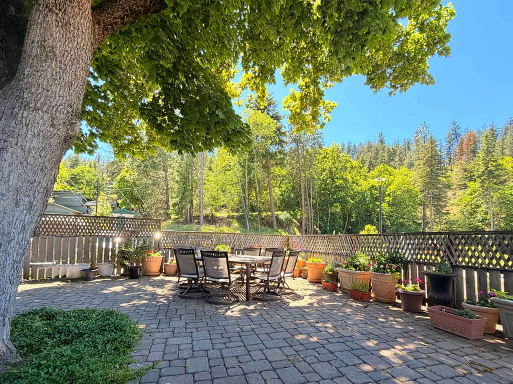 Wake up in the heart of Coeur d'Alene's most walkable neighborhood—a thoughtfully restored 1920s home where 5 bedrooms, 3 bathrooms, and genuine gathering spaces make it the perfect retreat for families and friend groups. Walk to restaurants, downtown shops, McEuen Park's splash pad and playgrounds, and the City Beach boardwalk. With a real kitchen designed for cooking, free parking, and outdoor spaces perfect for evening gatherings, everything your group needs is here or steps away.