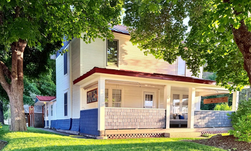 Step into timeless Coeur d’Alene charm in this restored 1920s home with 5 bedrooms and 3 baths. Relax on the front porch, gather around the fire table, or enjoy meals on the deck with a gas grill. Located across from McEuen Park and steps from Tubbs Hill, you’re just a short walk from downtown dining, shops, the waterfront, and local attractions. With a full kitchen and easy parking, this inviting home is perfect for making memories together.