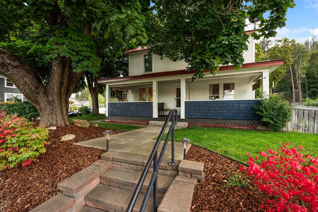 Step into timeless Coeur d’Alene charm in this restored 1920s home with 5 bedrooms and 3 baths. Relax on the front porch, gather around the fire table, or enjoy meals on the deck with a gas grill. Located across from McEuen Park and steps from Tubbs Hill, you’re just a short walk from downtown dining, shops, the waterfront, and local attractions. With a full kitchen and easy parking, this inviting home is perfect for making memories together.