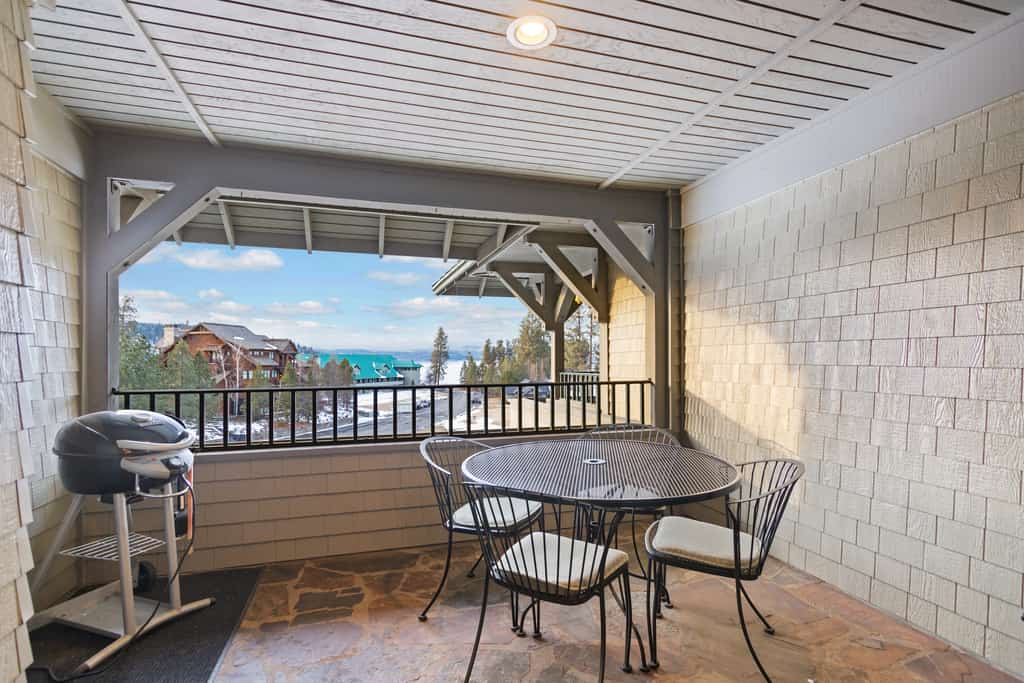 Your lakeside stay starts here, with a modern single-level condo overlooking Lake Coeur d’Alene. Take in beautiful lake and mountain views from the private balcony, or enjoy the indoor pool and direct beach access. The 2-bedroom, 2-bathroom condo also features a fully equipped kitchen, cozy fireplace, dining space, and BBQ grill—plus a prime location next to Gozzer Ranch.