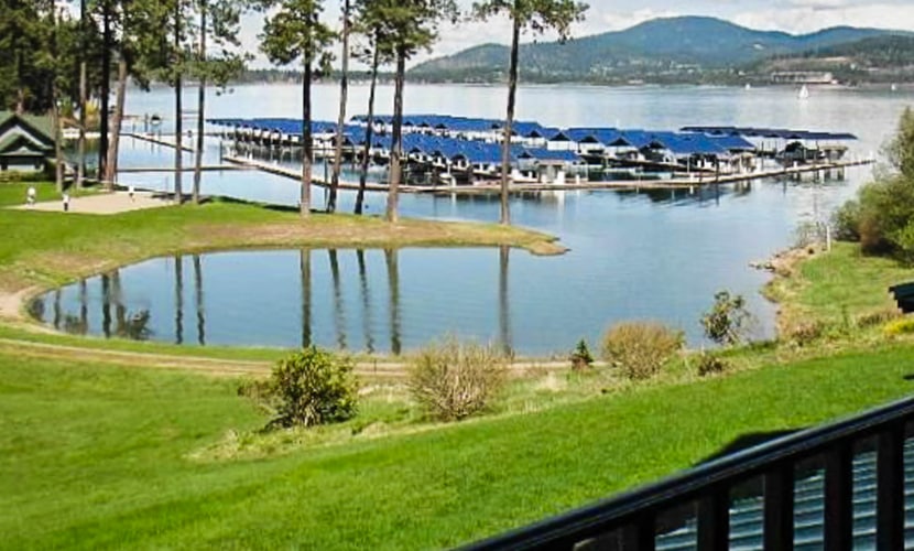 Your lakeside stay starts here, with a modern single-level condo overlooking Lake Coeur d’Alene. Take in beautiful lake and mountain views from the private balcony, or enjoy the indoor pool and direct beach access. The 2-bedroom, 2-bathroom condo also features a fully equipped kitchen, cozy fireplace, dining space, and BBQ grill—plus a prime location next to Gozzer Ranch.