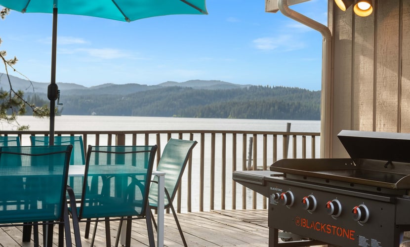 Tucked among the trees along the western shore of Lake Coeur d’Alene, this private cabin offers a true escape from the everyday. The 4-bedroom, 2-bathroom home accommodates up to 8 guests, with plenty of space to gather, unwind, and enjoy the lake. Spend your days kayaking from the private dock, relaxing on the deck, or enjoying a meal outdoors before settling in for a cozy evening by the fireplace.
