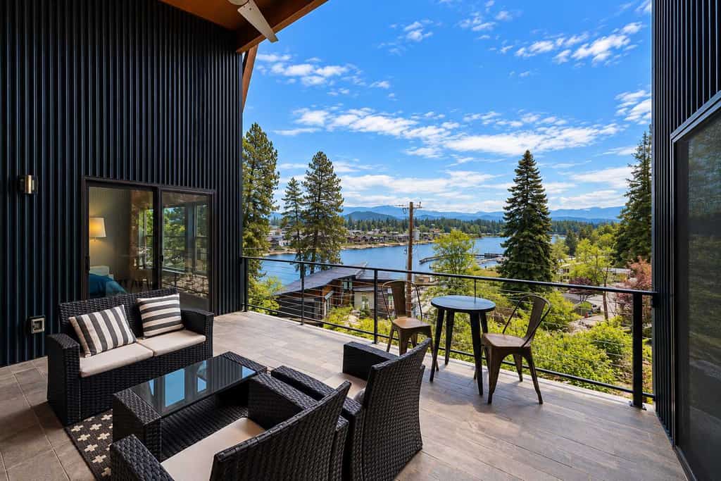 Escape to this stunning riverview house in Coeur d Alene featuring breathtaking mountain scenery and a private balcony. Perfect for families, this home offers a peaceful backyard, modern amenities, and easy access to local beaches, golf, and shopping. Whether you are cycling by the river or relaxing with board games, our home provides the ultimate Idaho retreat. Enjoy a fully equipped kitchen, comfortable king beds, and a laptop friendly workspace in a prime location designed for your perfect getaway.