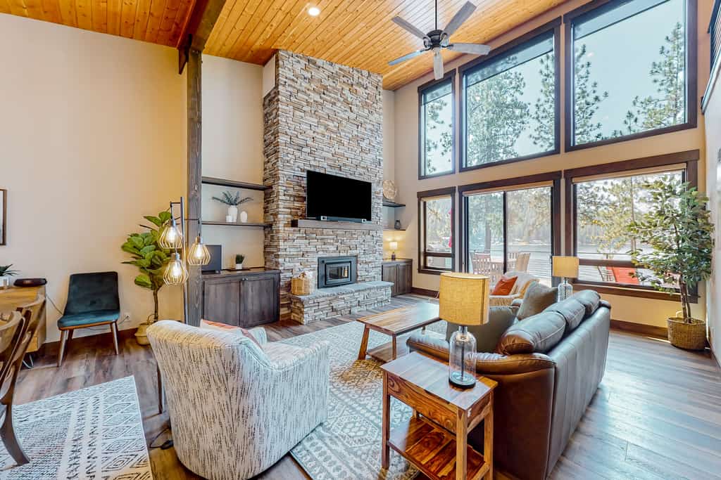 Escape to a luxurious lakefront retreat on a private point of Lake Coeur d’Alene. Enjoy stunning sunset views, direct shoreline access, a private dock, and an expansive deck with a grill and fire table. Inside, unwind in a beautifully designed 3-bedroom, 3-bathroom home featuring a gourmet kitchen, cozy fireplace, and inviting spaces for up to 8 guests. Peaceful, private, and perfect for unforgettable lake days.