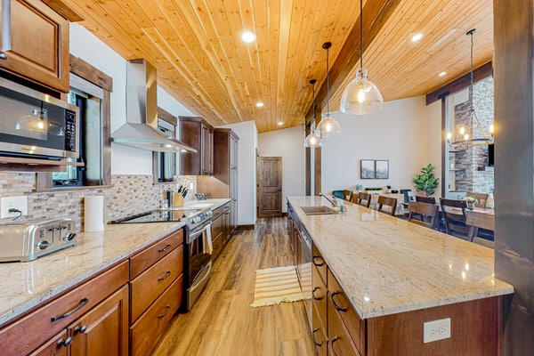 Escape to a luxurious lakefront retreat on a private point of Lake Coeur d’Alene. Enjoy stunning sunset views, direct shoreline access, a private dock, and an expansive deck with a grill and fire table. Inside, unwind in a beautifully designed 3-bedroom, 3-bathroom home featuring a gourmet kitchen, cozy fireplace, and inviting spaces for up to 8 guests. Peaceful, private, and perfect for unforgettable lake days.