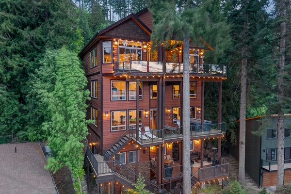Escape to luxury on Hayden Lake! This spacious 6-bedroom, 6-bathroom lakefront retreat is perfect for families and groups. Enjoy stunning lake and mountain views, a private dock, hot tub, sauna, private movie theater, and game room. With plenty of space to relax, unwind, and entertain, this home has everything you need for an unforgettable getaway. Come enjoy the lake, make lasting memories, and experience the ultimate retreat!