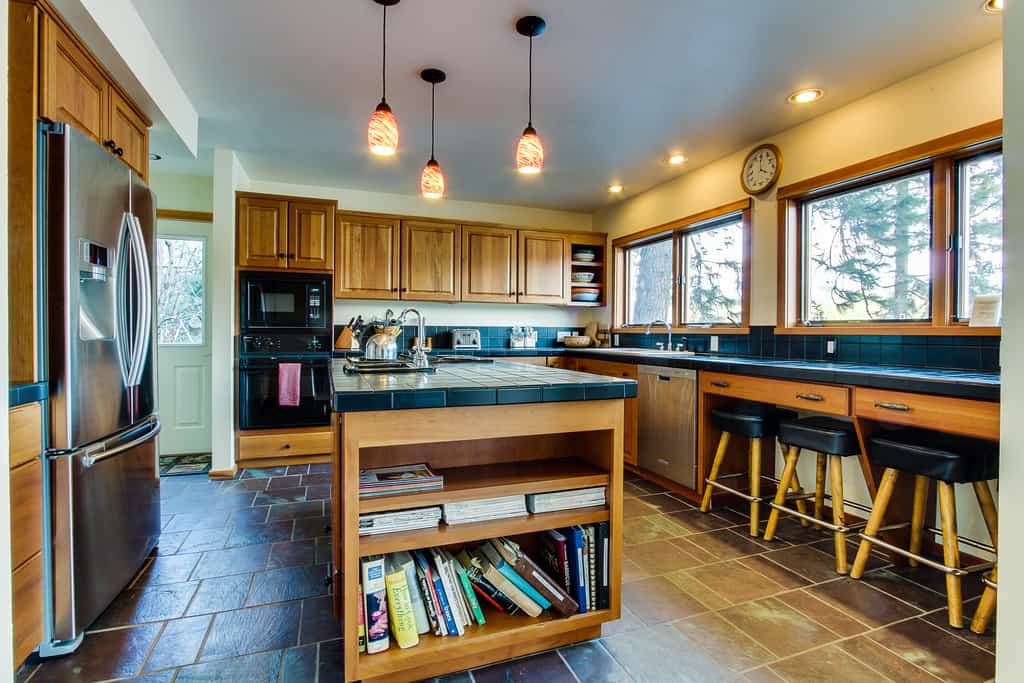 Wake up to breathtaking mountain and lake views at this stunning lakefront retreat on Hayden Lake's quiet western shore. With 3BR/3BA sleeping 8, a private dock, and a spacious deck made for lazy afternoons, this home is your escape from the everyday. Cozy up by the fireplace after a day on the water, or gather in the warm, open living space that makes every stay feel like home.
