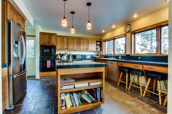 Wake up to breathtaking mountain and lake views at this stunning lakefront retreat on Hayden Lake's quiet western shore. With 3BR/3BA sleeping 8, a private dock, and a spacious deck made for lazy afternoons, this home is your escape from the everyday. Cozy up by the fireplace after a day on the water, or gather in the warm, open living space that makes every stay feel like home.