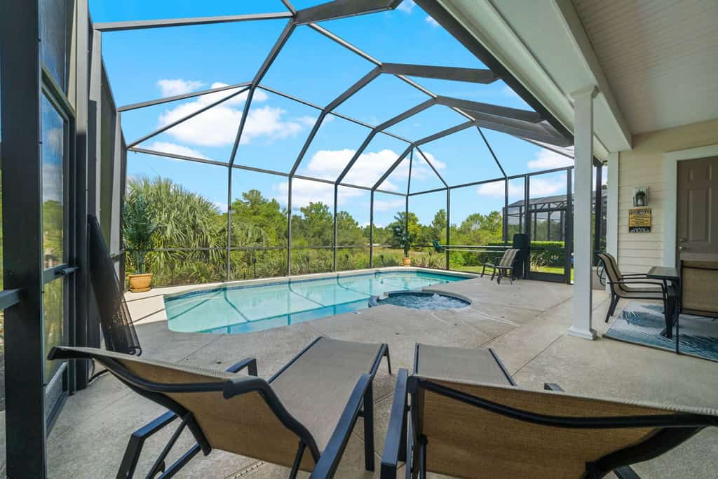 Tropical Retreat With Screened in Private Pool and Spa at Reunion