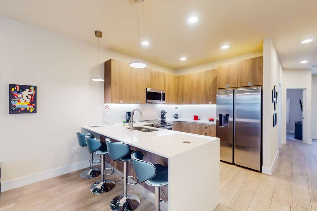 Dog-friendly retreat with pool, covered patio, children's items, grill, and AC