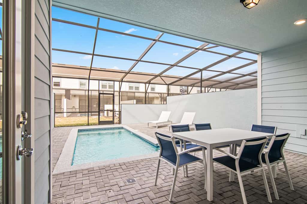 Luxury home with private pool, lanai, shared games room, central AC, & WD