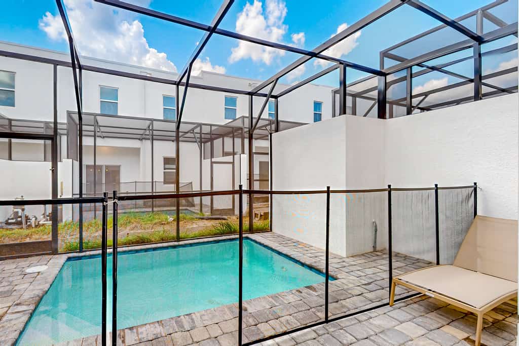 Two-story, dog-friendly townhouse with a lanai, private pool, & washer/dryer