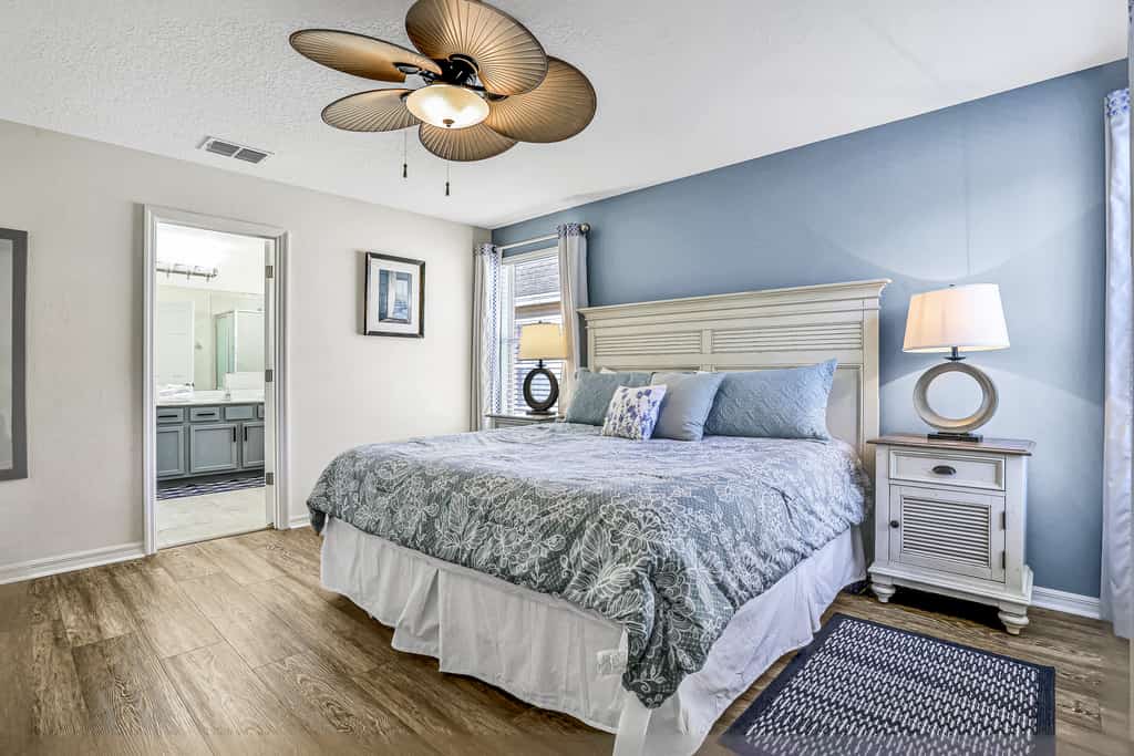 Colorful home with pool, patio, kitchen, washer/dryer, & game room