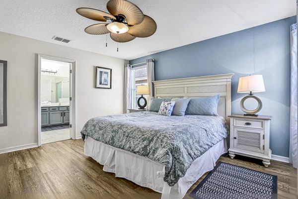 Colorful home with pool, patio, kitchen, washer/dryer, & game room