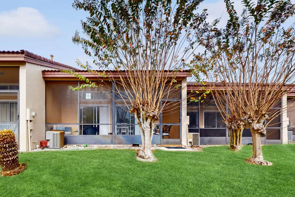 Ideally located modern townhome with open layout & pool - snowbird-friendly