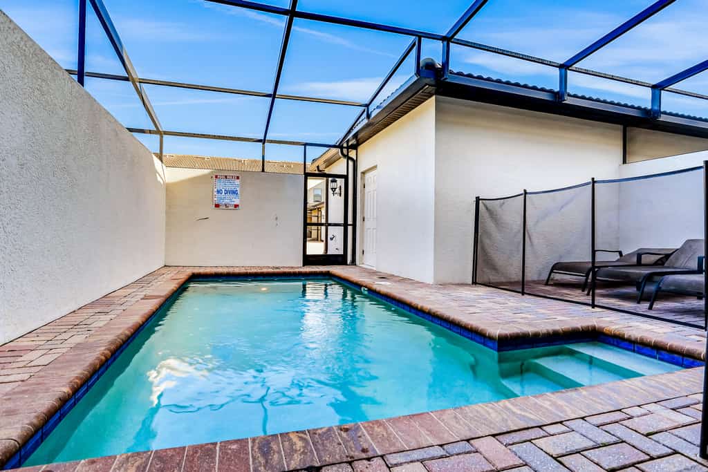 Updated & colorful home w/ a modern kitchen, furnished lanai, & private pool