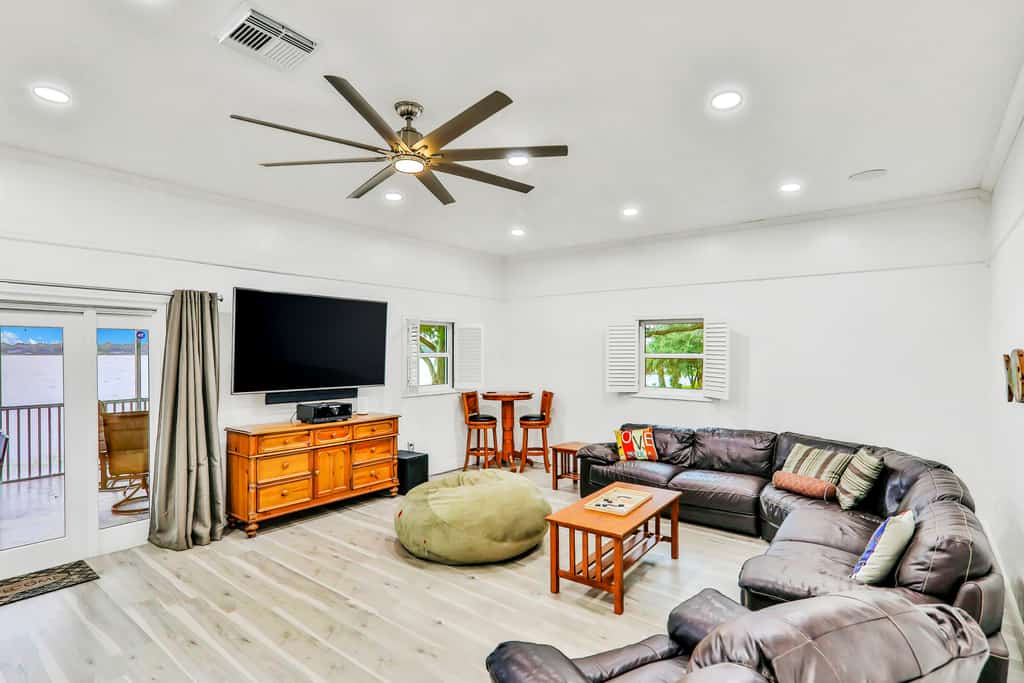 Dog-friendly lakefront home with fast WiFi, central AC, patio, & game room