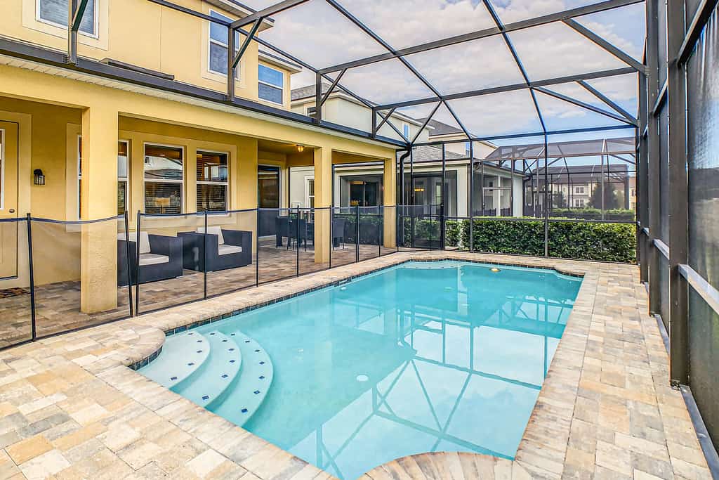Resort home with private pool, patio, foosball & 2 living areas - near Disney