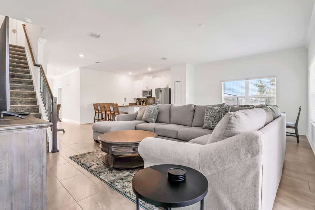Updated townhome with an enclosed pool, five bedrooms, W/D - close to everything