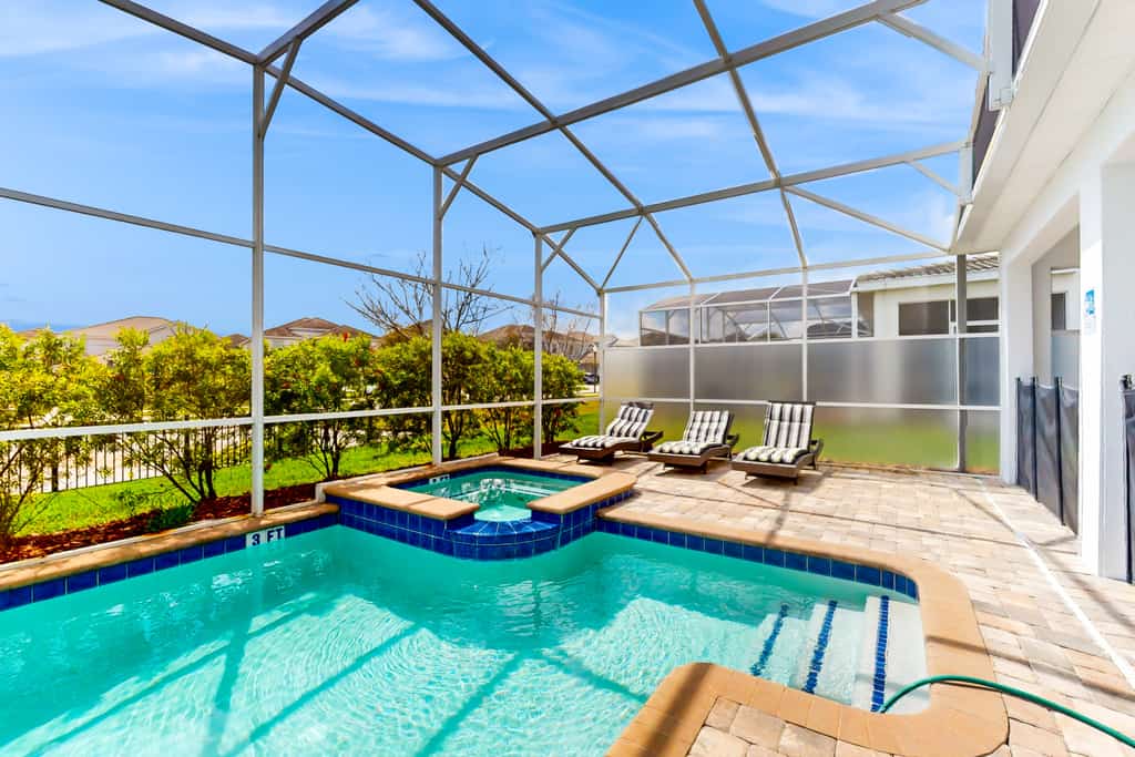 Two-story home with amazing pool, pool spa, game rooms, & washer/dryer