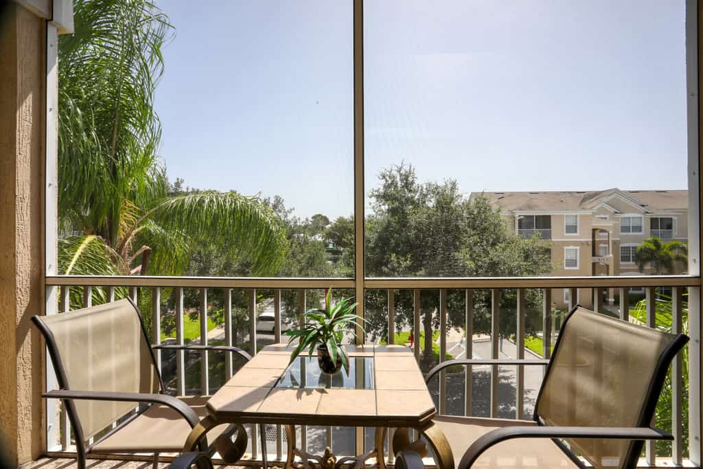 Resort condo with pools, hot tub, game room, tennis, gym, balcony, AC, & W/D