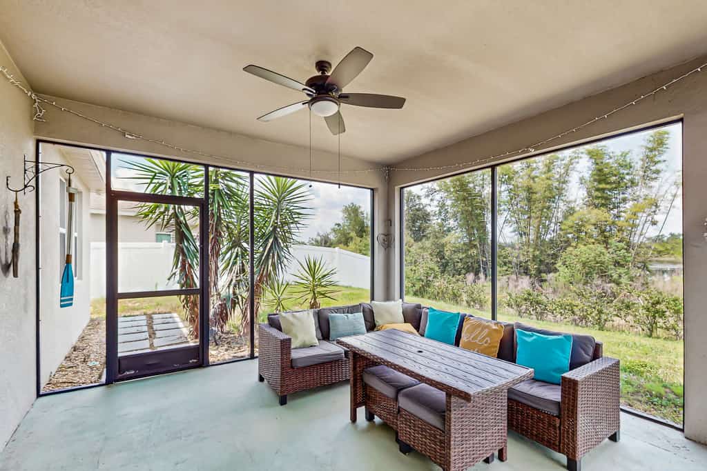 Dog-friendly ground-floor home in gated community w/lake views & enclosed patio